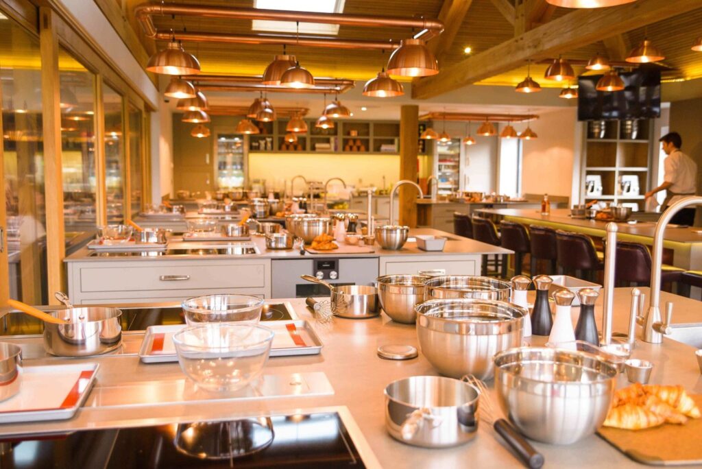 Chewton Glen kitchen team using automated food labeling for prepared ingredients.