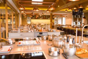 Chewton Glen kitchen team using automated food labeling for prepared ingredients.